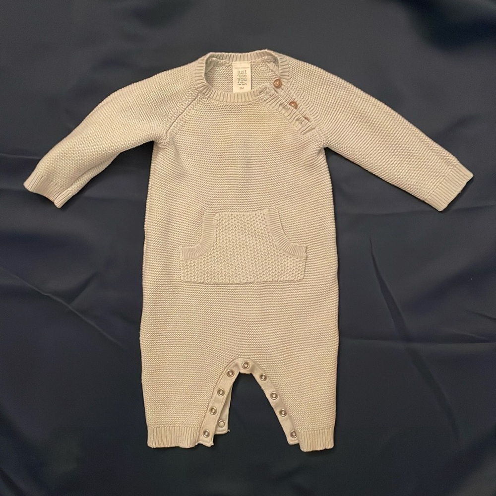 Knit romper with shoulder buttons